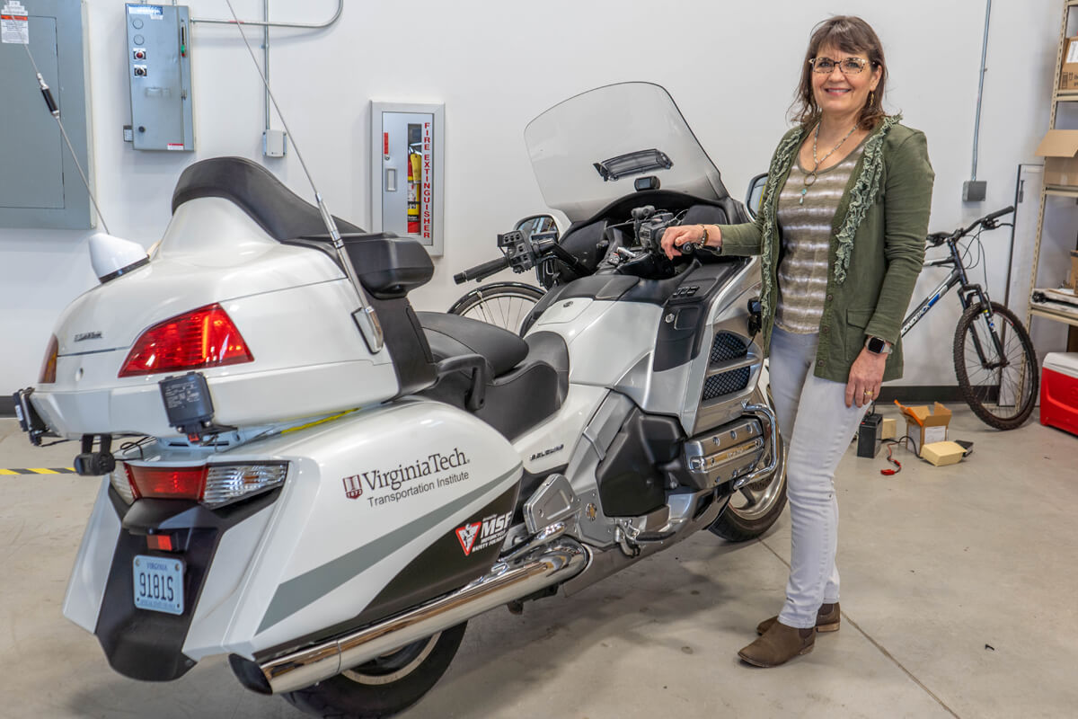 Vicki Williams with one of VTTI's motorcycles.